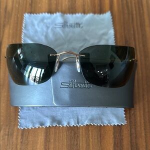 Silhouette Black Sunglasses with Gold Accents